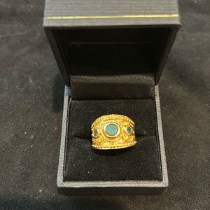 Elegant Gold and Green Ring